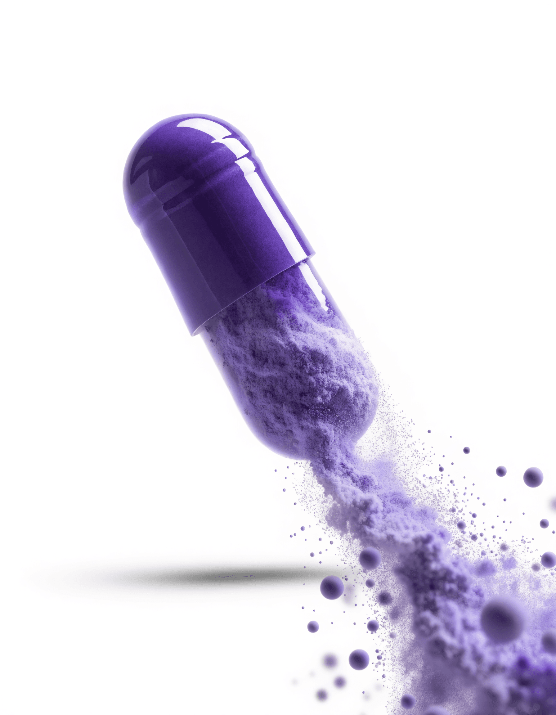 A glossy purple capsule opening mid-air, its contents dissolving into fine lavender powder